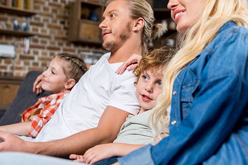 family watching tv together